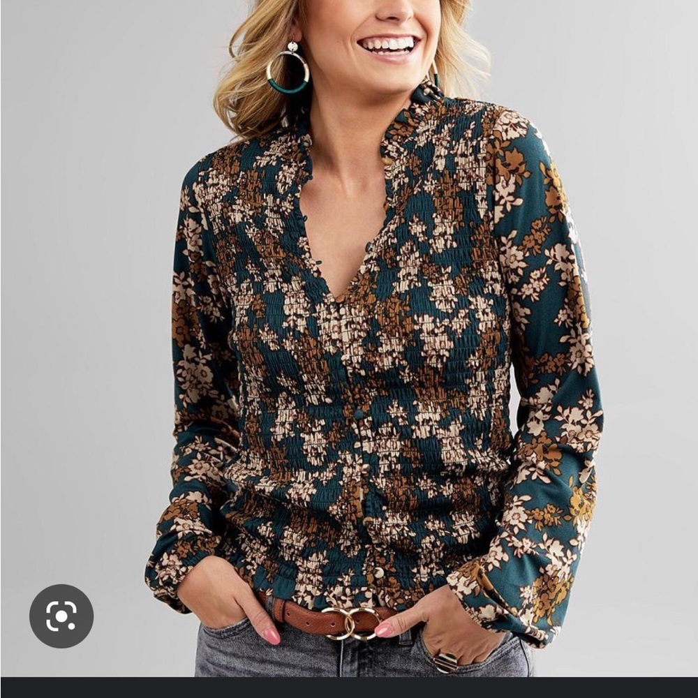 ISO gimmicks floral blouse medium or Large